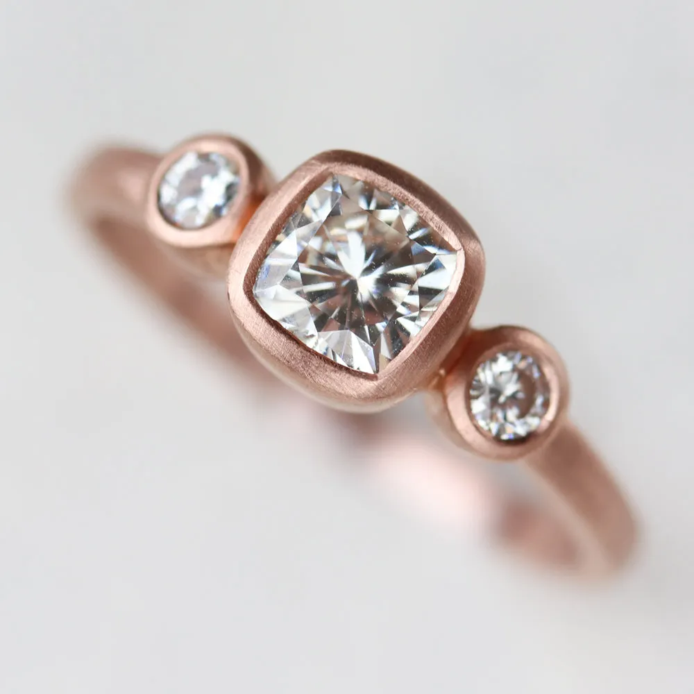 Bezel-set Cushion Three Stone Ring •