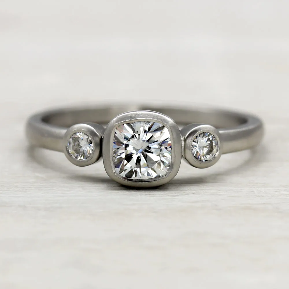 Bezel-set Cushion Three Stone Ring •